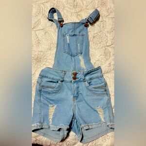 Denim shorts with suspenders. New. Gentle.